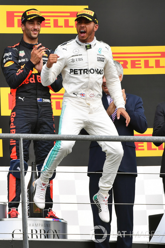 Race winner Lewis Hamilton, Mercedes AMG F1, celebrates on the podium