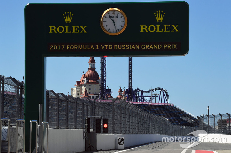 Rolex clock and signage in pit lane