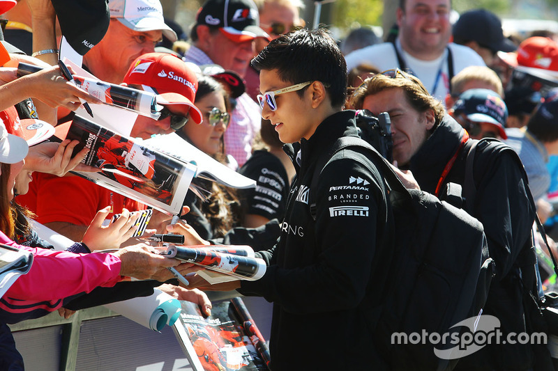 Rio Haryanto, Manor Racing signs autographs for the fans
