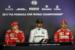 Kimi Raikkonen, Ferrari, pole sitter Lewis Hamilton, Mercedes AMG F1 and Sebastian Vettel, Ferrari i