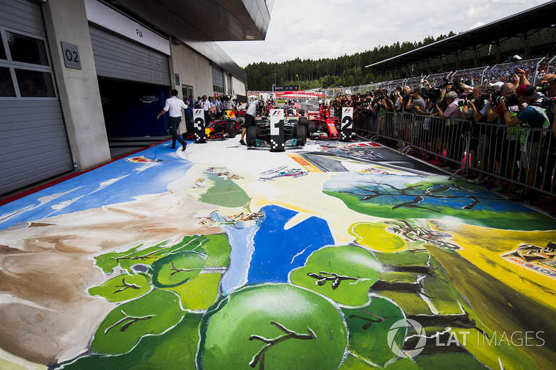 The top three drivers arrive in Parc Ferme