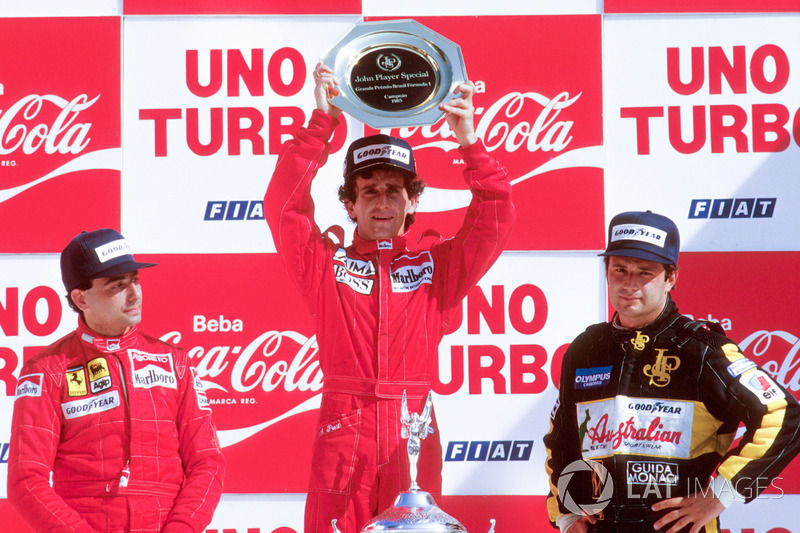 Podium: race winner Alain Prost, McLaren TAG Porsche, second place Michele Alboreto, Ferrari, third 