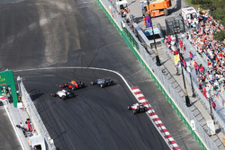 (L to R): Valtteri Bottas, Williams FW38, Max Verstappen, Red Bull Racing RB12, and Lewis Hamilton, Mercedes AMG F1 W07 Hybrid, battle for position