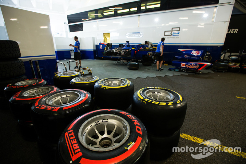 Pirelli tyres in front of Carlin garage