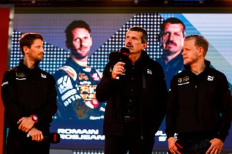 Romain Grosjean, Haas F1 Team, Guenther Steiner, Team Principal, Haas F1 and Kevin Magnussen, Haas F1 Team on stage at the Federation Square event