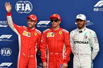 (L to R): Sebastian Vettel, Ferrari, pole sitter Kimi Raikkonen, Ferrari and Lewis Hamilton, Mercedes AMG F1 celebrate in parc ferme