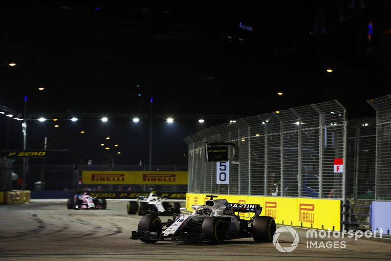Lance Stroll, Williams FW41, leads Sergey Sirotkin, Williams FW41