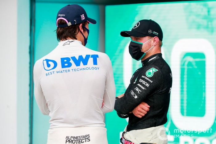 Tercero Lance Stroll, Racing Point y el segundo Valtteri Bottas, Mercedes-AMG Petronas F1 en Parc Ferme