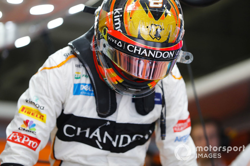 Stoffel Vandoorne, McLaren, enters his cockpit