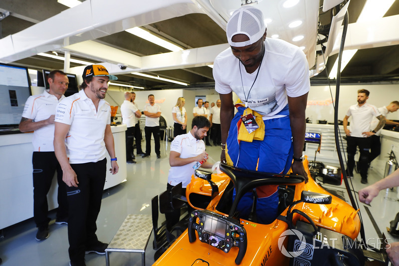 Spaniard Serge Ibaka Congolause of the NBAs Toronto Raptors tries the seat in the car of Fernando Al