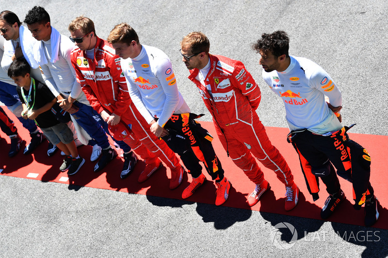 Drivers observe the National Anthem