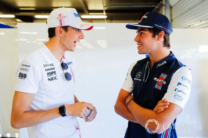 Esteban Ocon, Force India, con Lance Stroll, Williams Racing