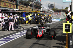 Romain Grosjean, Haas F1 Team VF-18 Ferrari, Nico Hulkenberg, Renault Sport F1 Team R.S. 18, in the pit lane