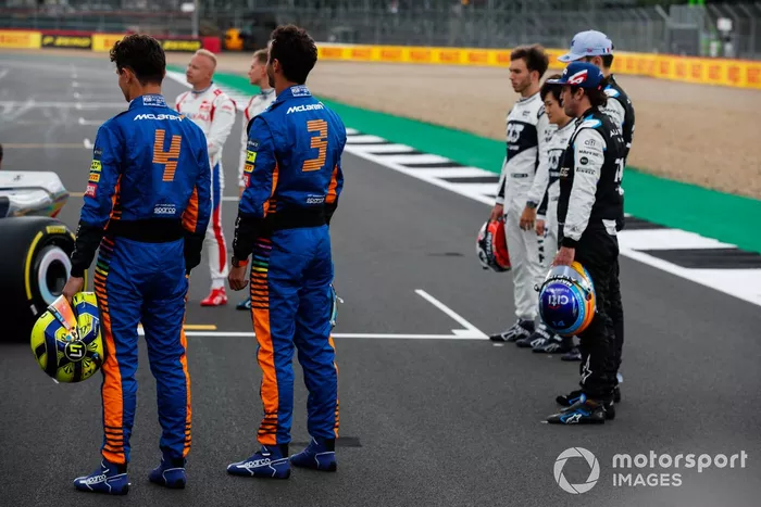 The 2022 Formula 1 car launch event on the Silverstone grid. L-R: Lando Norris, McLaren, Nikita Mazepin, Haas F1, Mick Schumacher, Haas F1, Daniel Ricciardo, McLaren, Pierre Gasly, AlphaTauri, Yuki Tsunoda, AlphaTauri, Fernando Alonso, Alpine F1 and Esteban Ocon, Alpine F1