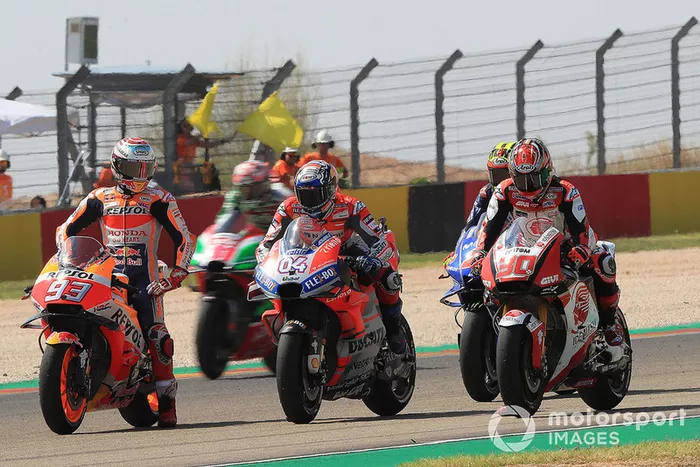 Marc Márquez, Repsol Honda Team, Andrea Dovizioso, Ducati Team, practican una arrancada