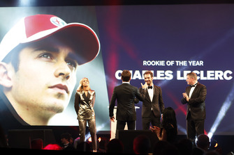 Rookie of the Year Charles Leclerc is greeting on stage by FIA Formula E Chamion Jean Eric Vergne