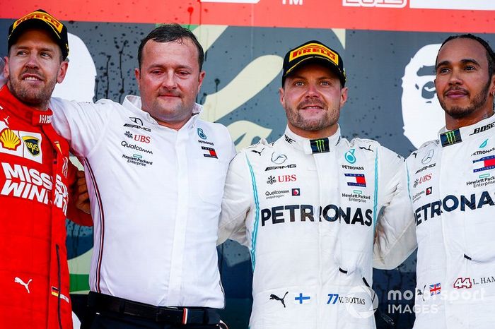 Sebastian Vettel, Ferrari, 2nd position, Eric Blandin, Chief Aerodynamicist, Mercedes AMG, Valtteri Bottas, Mercedes AMG F1, 1st position, and Lewis Hamilton, Mercedes AMG F1, 3rd position, on the podium
