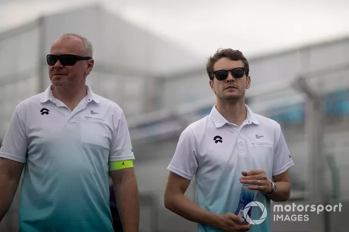 Tom Dillmann, NIO Formula E Team, walks the track with a team member