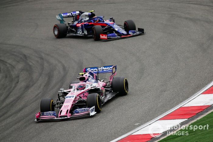 Lance Stroll, Racing Point RP19, leads Alexander Albon, Toro Rosso STR14