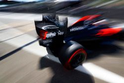 Fernando Alonso, McLaren exits the pit garage.