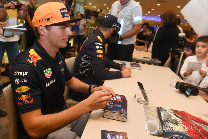 Max Verstappen, Red Bull Racing and Daniel Ricciardo, Red Bull Racing sign autographs for the fans at the autograph session