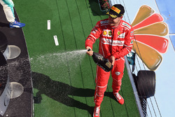 Podium: race winner Sebastian Vettel, Ferrari