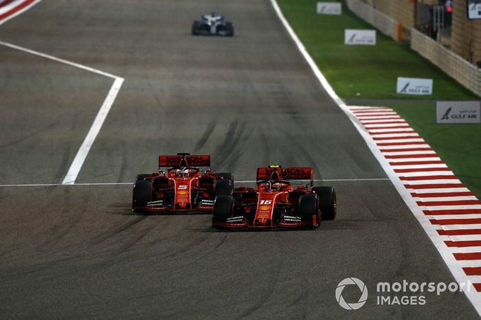 Sebastian Vettel, Ferrari SF90, battles with Charles Leclerc, Ferrari SF90
