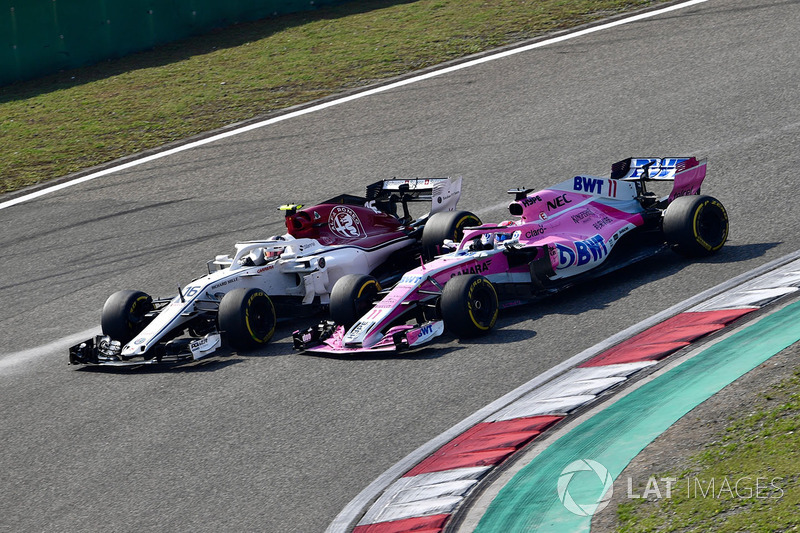 Charles Leclerc, Sauber C37 and Sergio Perez, Force India VJM11