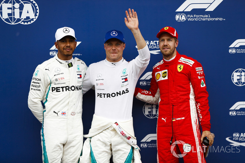 Pole sitter Valtteri Bottas, Mercedes AMG F1, second place Lewis Hamilton, Mercedes AMG F1, third place Sebastian Vettel, Ferrari