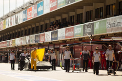 The car of Esteban Gutierrez, Haas F1 Team is pushed back in the pits