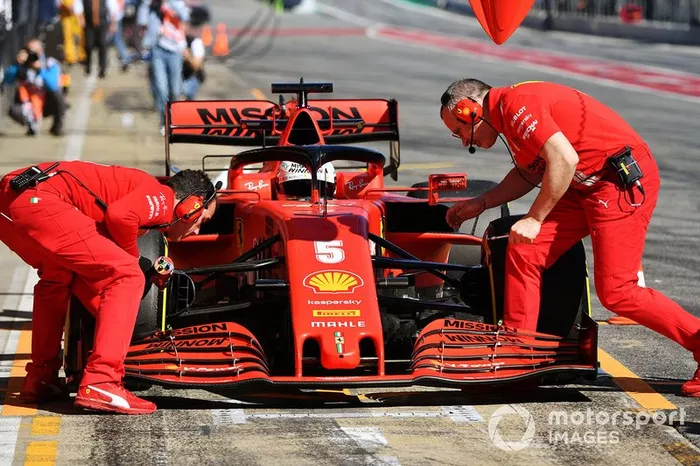 Sebastian Vettel, Ferrari, stops in his pit