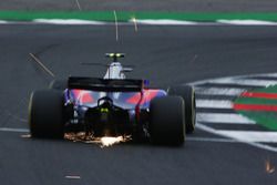 Sparks fly from Carlos Sainz Jr., Scuderia Toro Rosso STR12