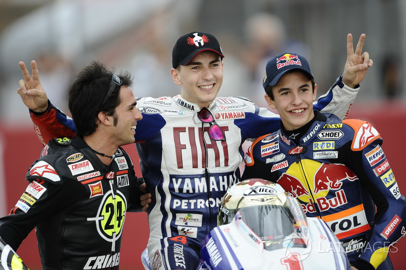 Toni Elias, Jorge Lorenzo y Marc Márquez, campeones del mundo de Moto2, MotoGP y 125cc, respectivamente, en 2010.