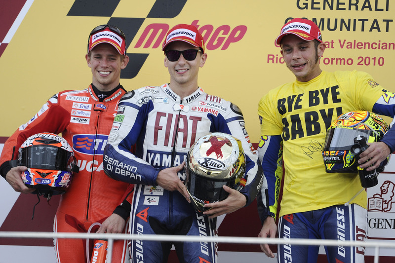 Podium; Race winner Jorge Lorenzo, Yamaha; second place Casey Stone, Ducati; third place Valentino Rossi, Yamaha