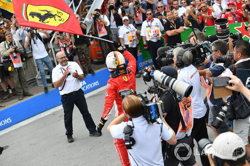 Race winner Sebastian Vettel, Ferrari celebrates in parc ferme