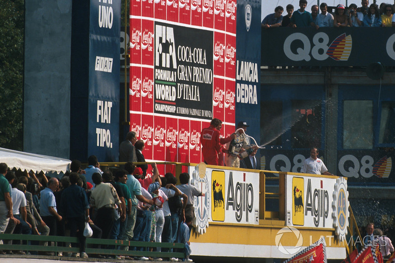 Podium: race winner Alain Prost, second place Gerhard Berger, third place Thierry Boutsen