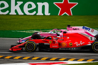 Sebastian Vettel, Ferrari SF71H, battles with Sergio Perez, Racing Point Force India VJM11