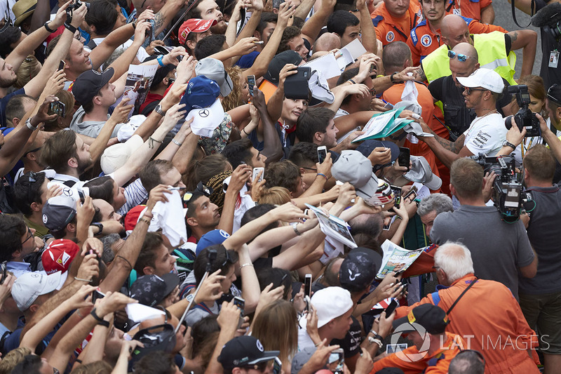 Lewis Hamilton, Mercedes AMG F1, signs autographs for fans