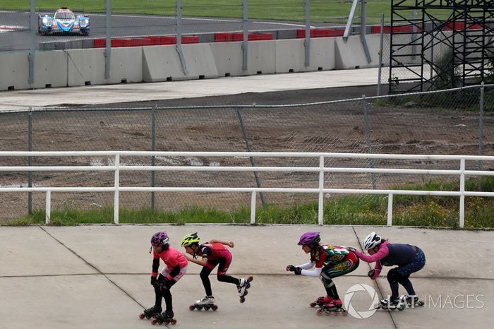 Skaters race the cars in Mexico City