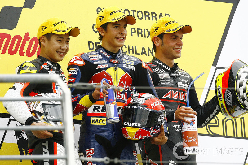 Podium : le vainqueur Marc Marquez, second place Tomoyoshi Koyama, le troisième, Sandro Cortese