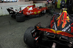 The damaged cars of Kimi Raikkonen, Ferrari SF70H and Max Verstappen, Red Bull Racing RB13 after col