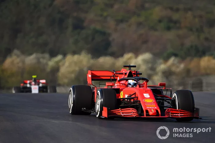 Sebastian Vettel, Ferrari SF1000, Kevin Magnussen, Haas VF-20
