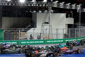 Fernando Alonso, Aston Martin AMR23, spins and collides with Valtteri Bottas, Alfa Romeo C43, as Sergio Perez, Red Bull Racing RB19, Nico Hulkenberg, Haas VF-23, Lewis Hamilton, Mercedes F1 W14, attempt to avoid the incident