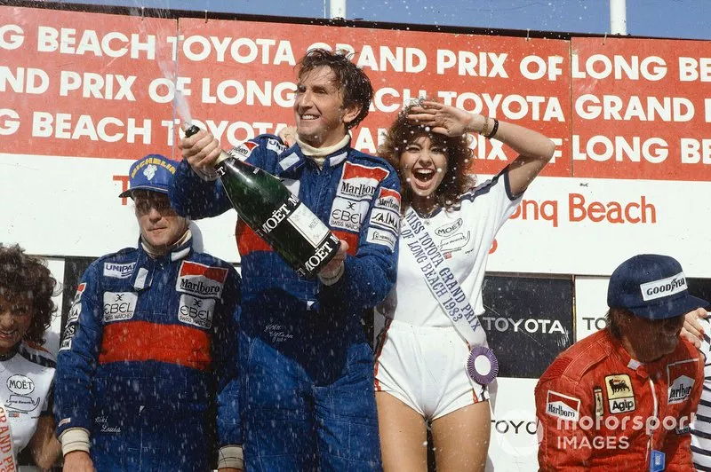 Podium: race winner John Watson, McLaren, second place Niki Lauda, McLaren, third place René Arnoux, Ferrari