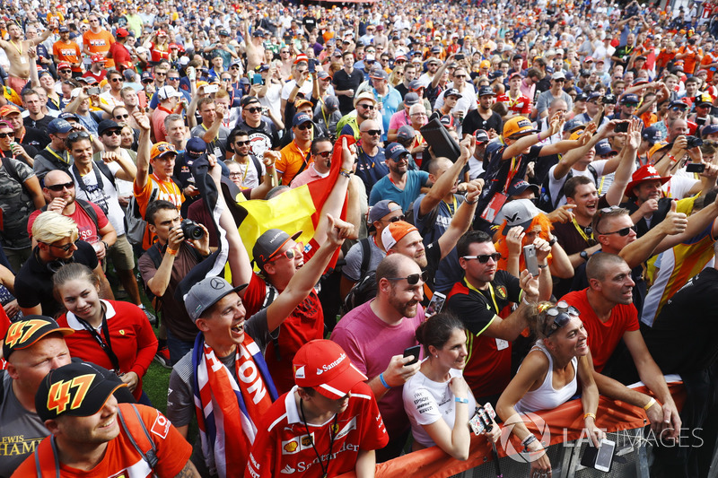 Fans gather around the stage in the F1 Fanzone
