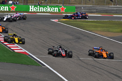Romain Grosjean, Haas F1 Team VF-18 and Fernando Alonso, McLaren MCL33 battle
