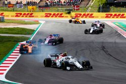 Charles Leclerc, Sauber C37, Fernando Alonso, McLaren MCL33 and Esteban Ocon, Force India VJM11