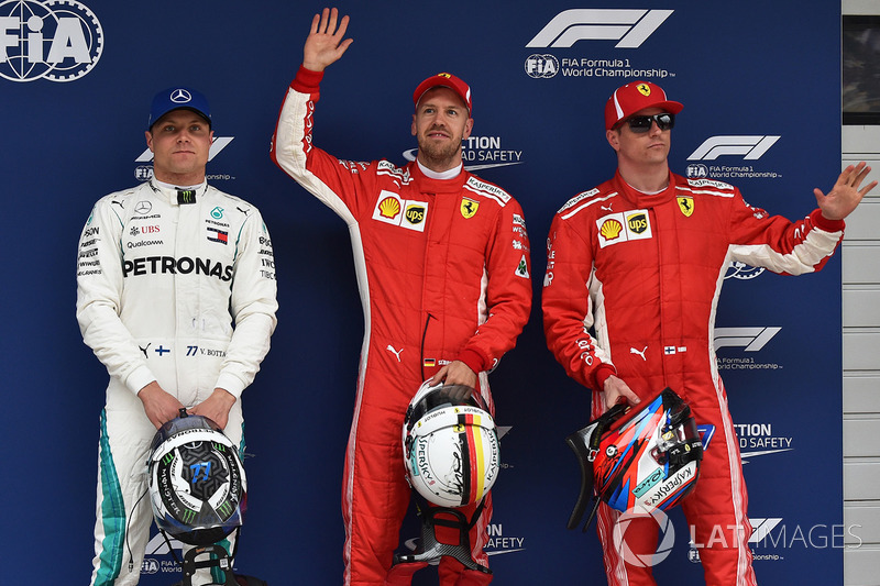 Polesitter Sebastian Vettel, Ferrari, second place Kimi Raikkonen, Ferrari, third place Valtteri Bot