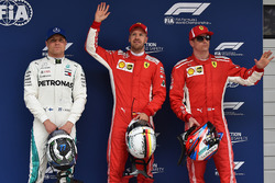 Polesitter Sebastian Vettel, Ferrari, second place Kimi Raikkonen, Ferrari, third place Valtteri Bottas, Mercedes AMG F1