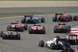 Sebastian Vettel, Ferrari SF16-H and Kimi Raikkonen, Ferrari SF16-H make contact at the start of the race